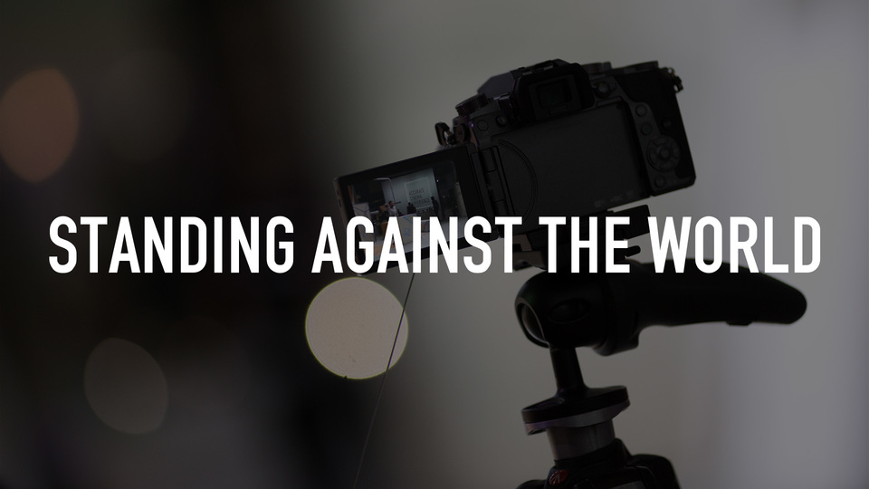 Standing Against the World