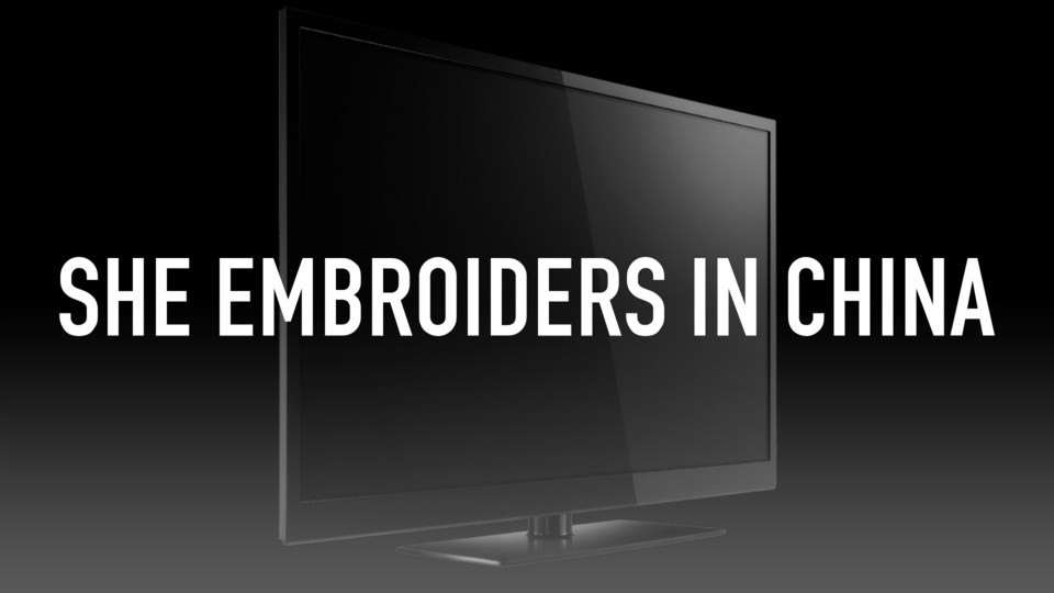 SHE EMBROIDERS IN CHINA